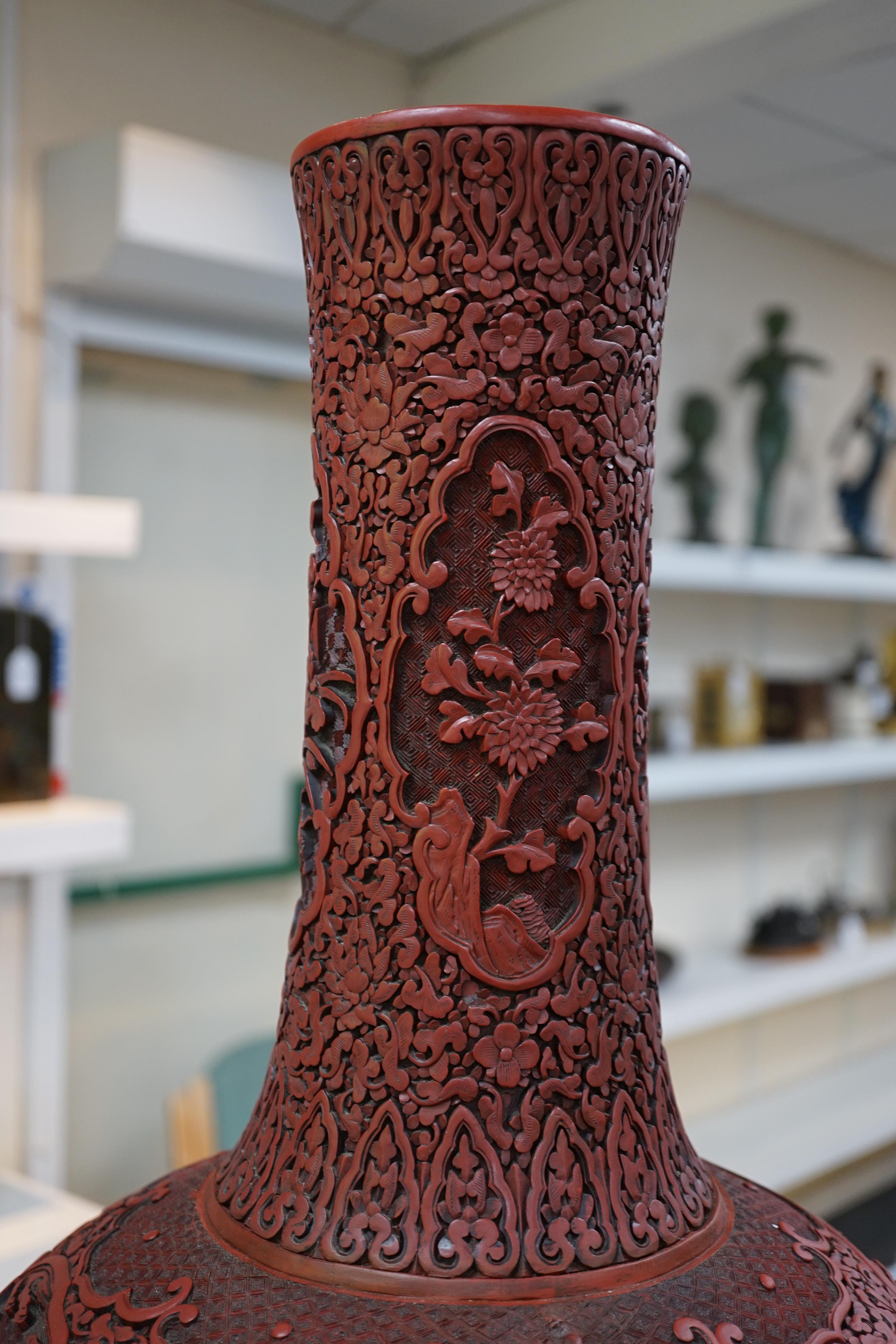 A large Chinese cinnabar lacquer bottle vase, 19th century, Some restoration